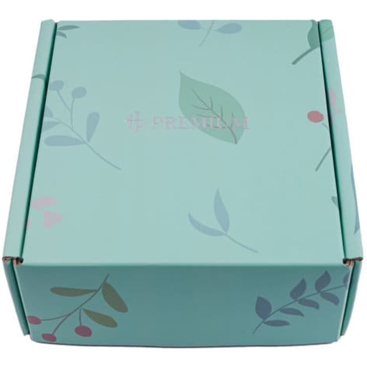 A teal packaging box with floral designs in pink and green. It has a logo on the surface.