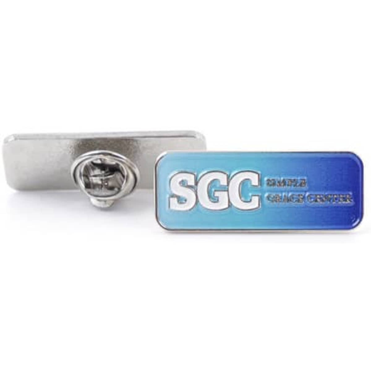 A custom metal pin in blue and silver, featuring a logo and a clasp on the back for attachment.