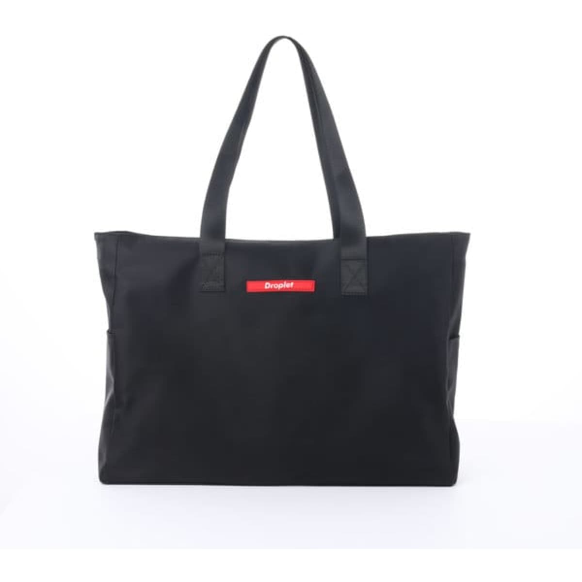 A black tote bag with sturdy handles and a small logo on the front, featuring a spacious interior.