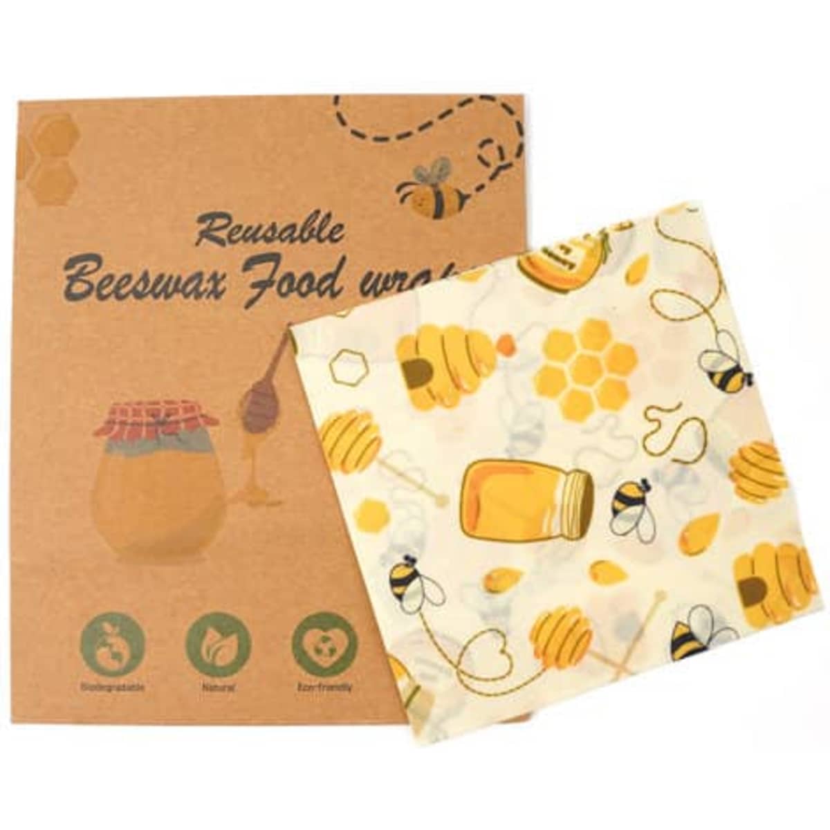 A reusable beeswax wrap in yellow and cream with honey and bee patterns, next to its cardboard packaging featuring a logo.