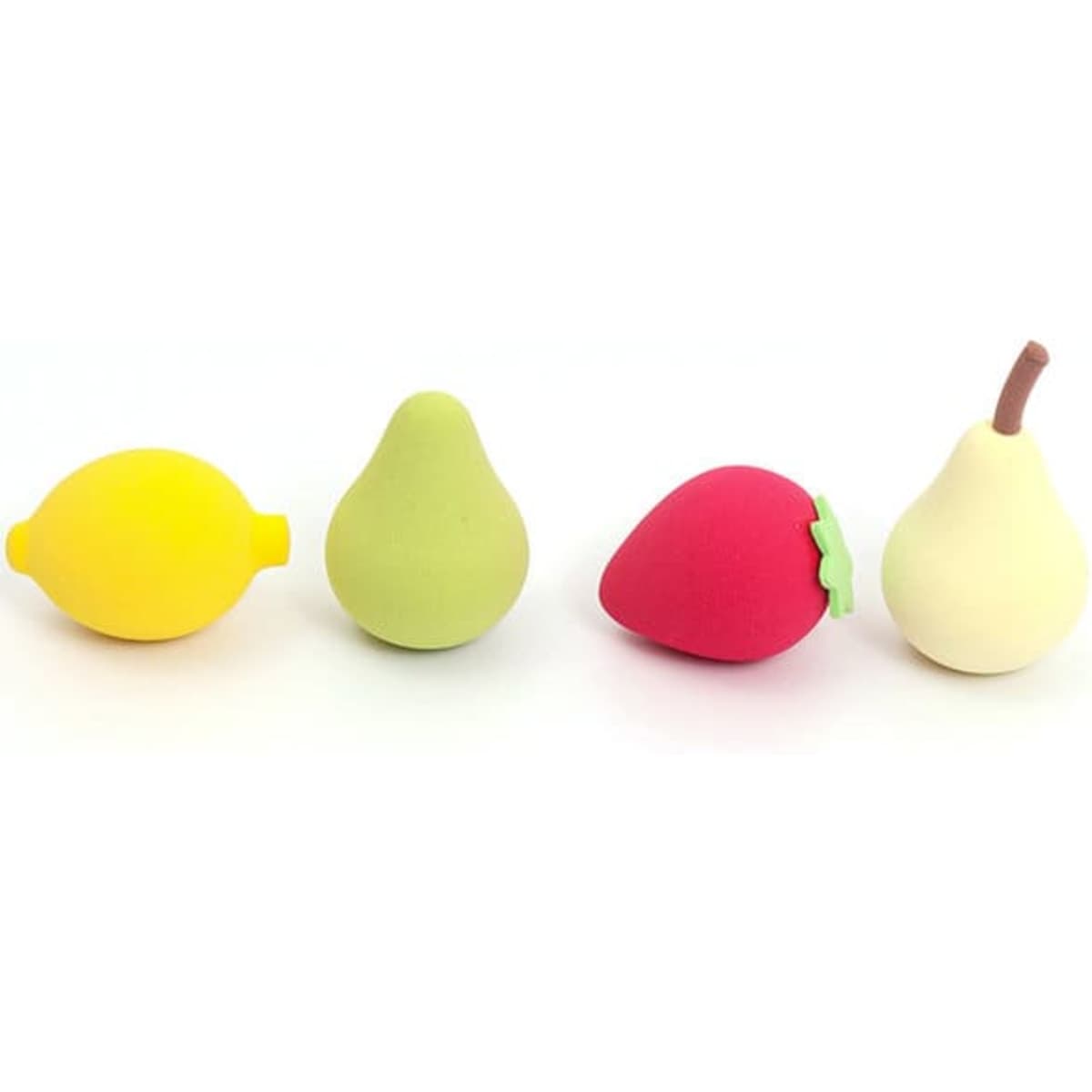 A set of four fruit-shaped beauty sponges in yellow, green, pink, and cream colours, with a logo visible.