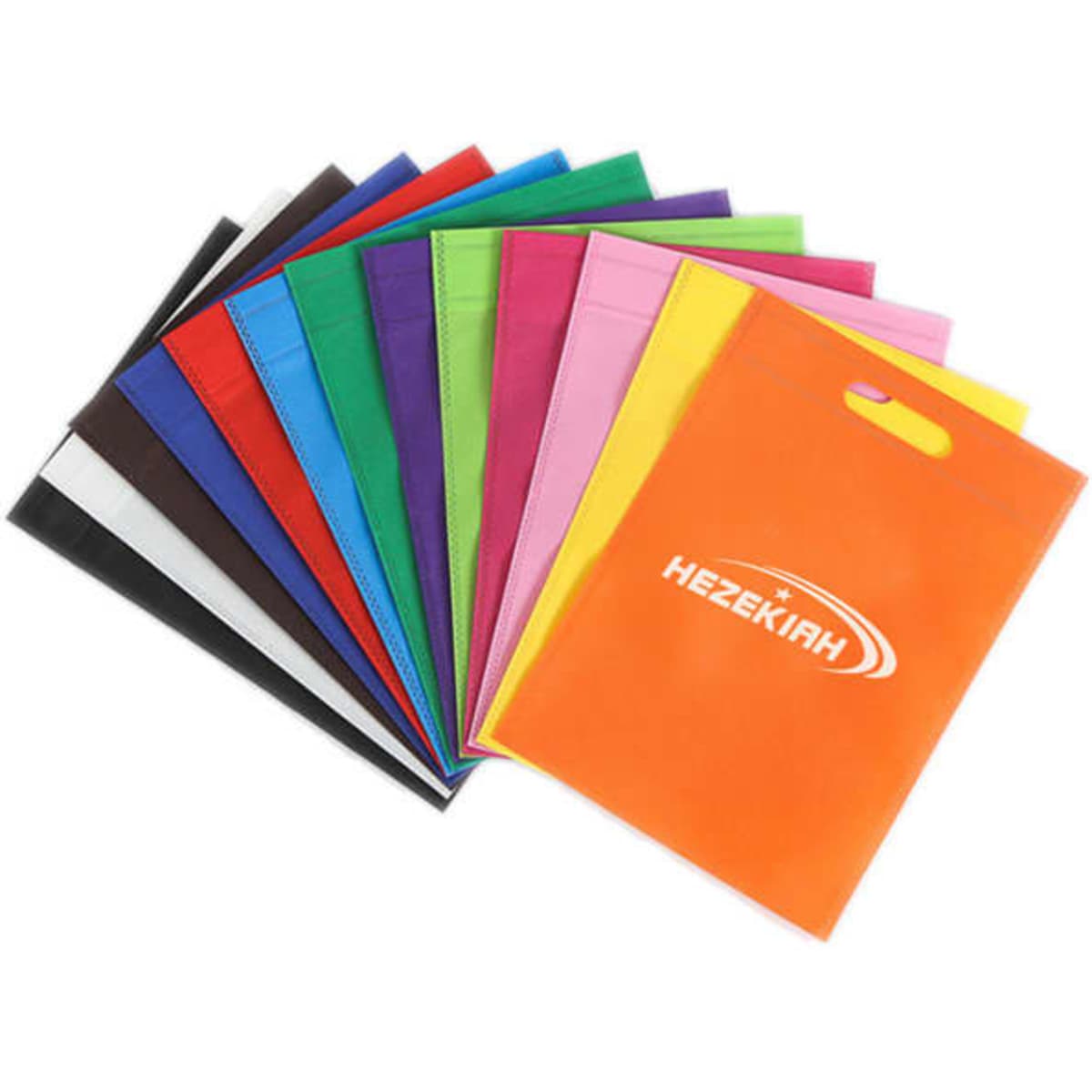 A variety of non-woven die cut bags in multiple colours, featuring one bag with a logo.
