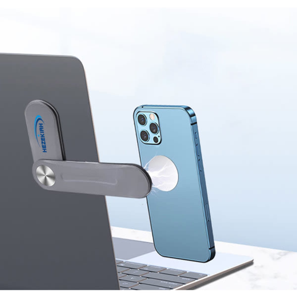 A silver laptop swivel phone holder securely attached to a laptop, holding a blue smartphone.