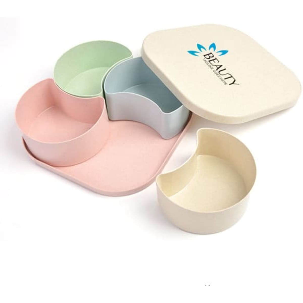 A four-compartment snack tray in pastel colours with a fitted lid, featuring a brand logo.