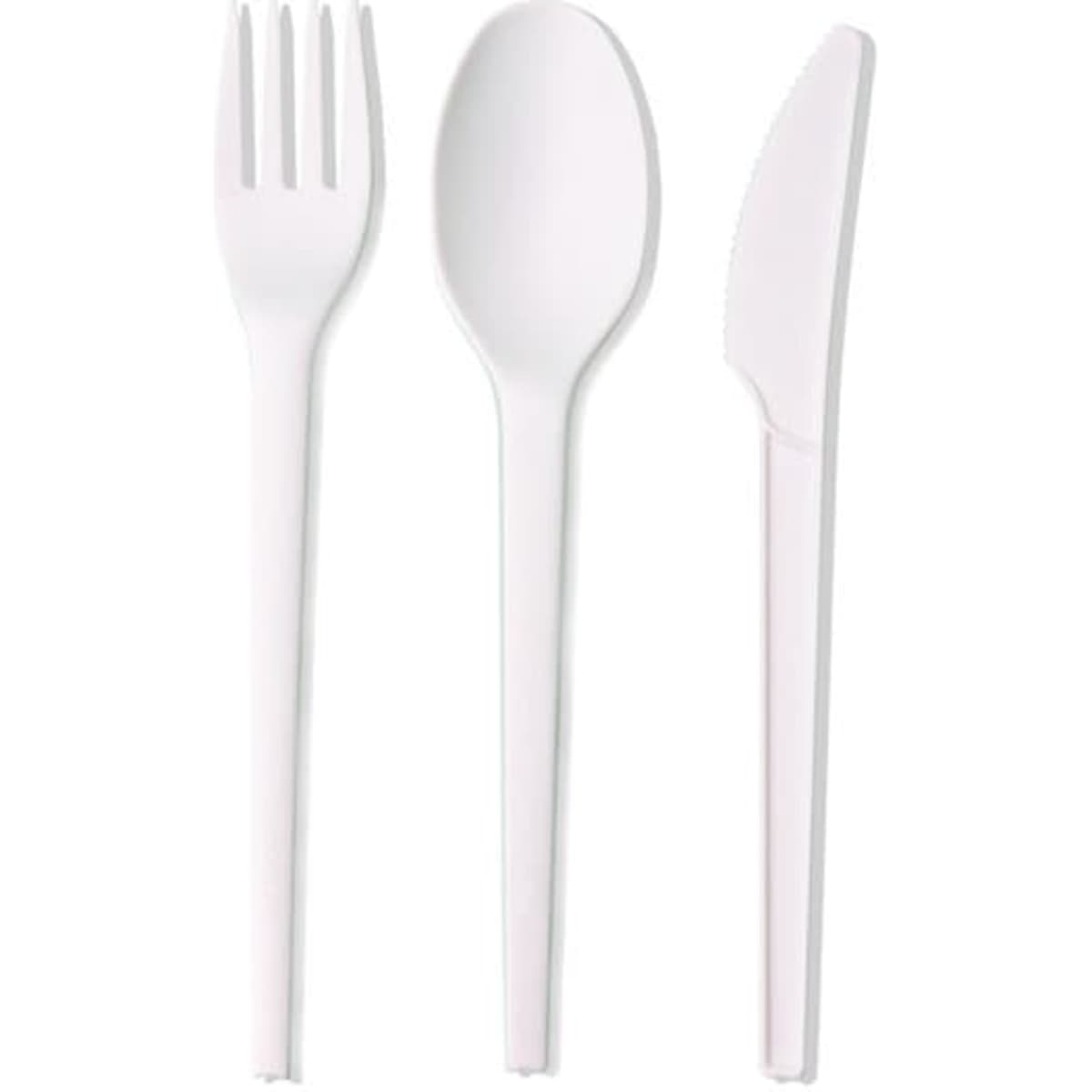 A set of white biodegradable cutlery including a fork, spoon, and knife, with a simple design.