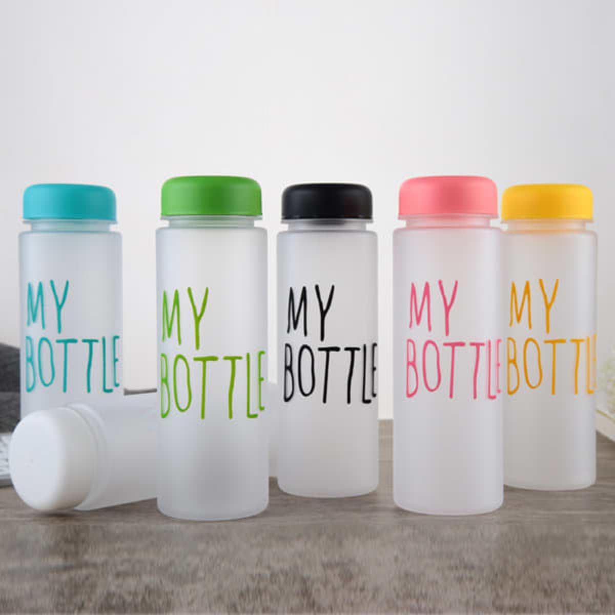 A drink bottle set featuring frosted plastic designs in pink, green, black, yellow, and clear, each with a logo.