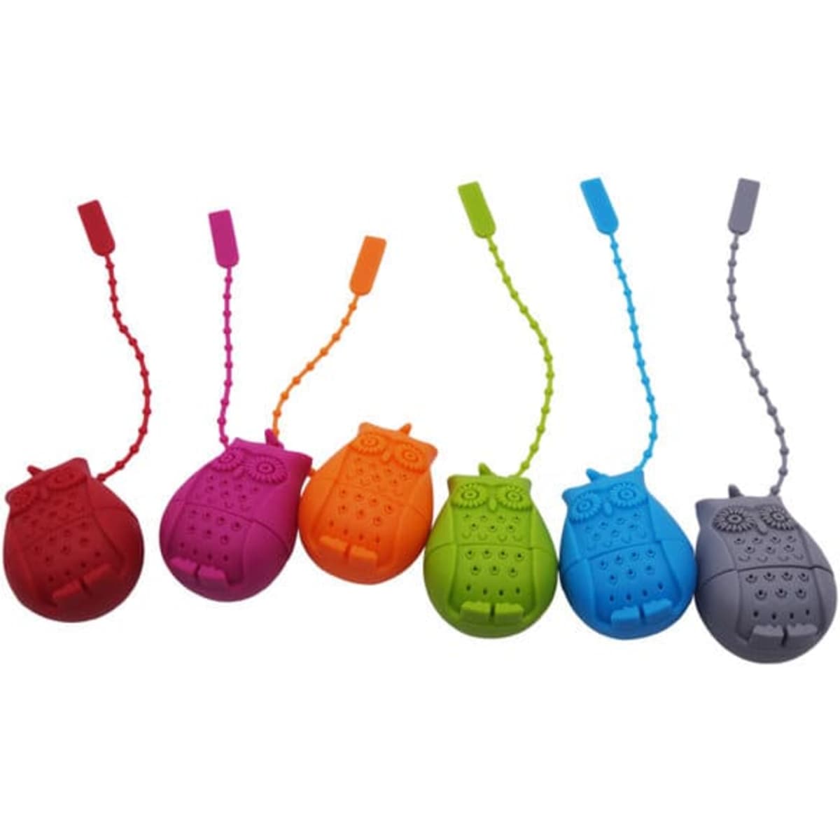 A collection of colourful owl-shaped silicone tea infusers in pink, orange, green, purple, blue, and grey, all with tails.