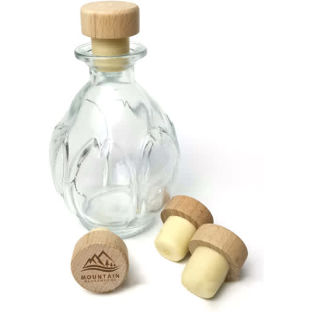 A drink bottle with a decorative glass body and wooden cork stoppers in natural tones. Features a logo.