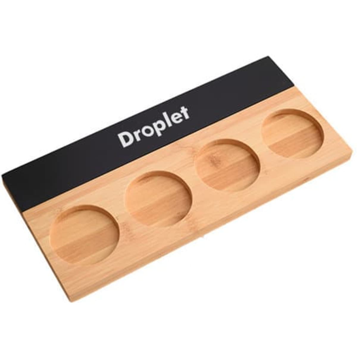 A wooden wine flight board featuring a black top and four circular indentations for glasses.