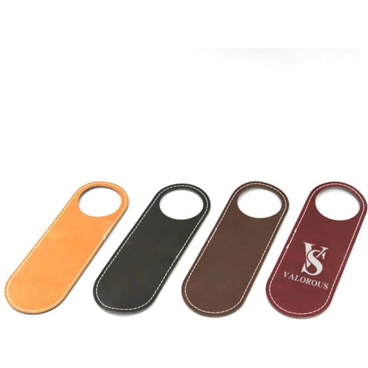 Four custom printed door hanger signs in orange, black, brown, and maroon, featuring a logo on the maroon one.