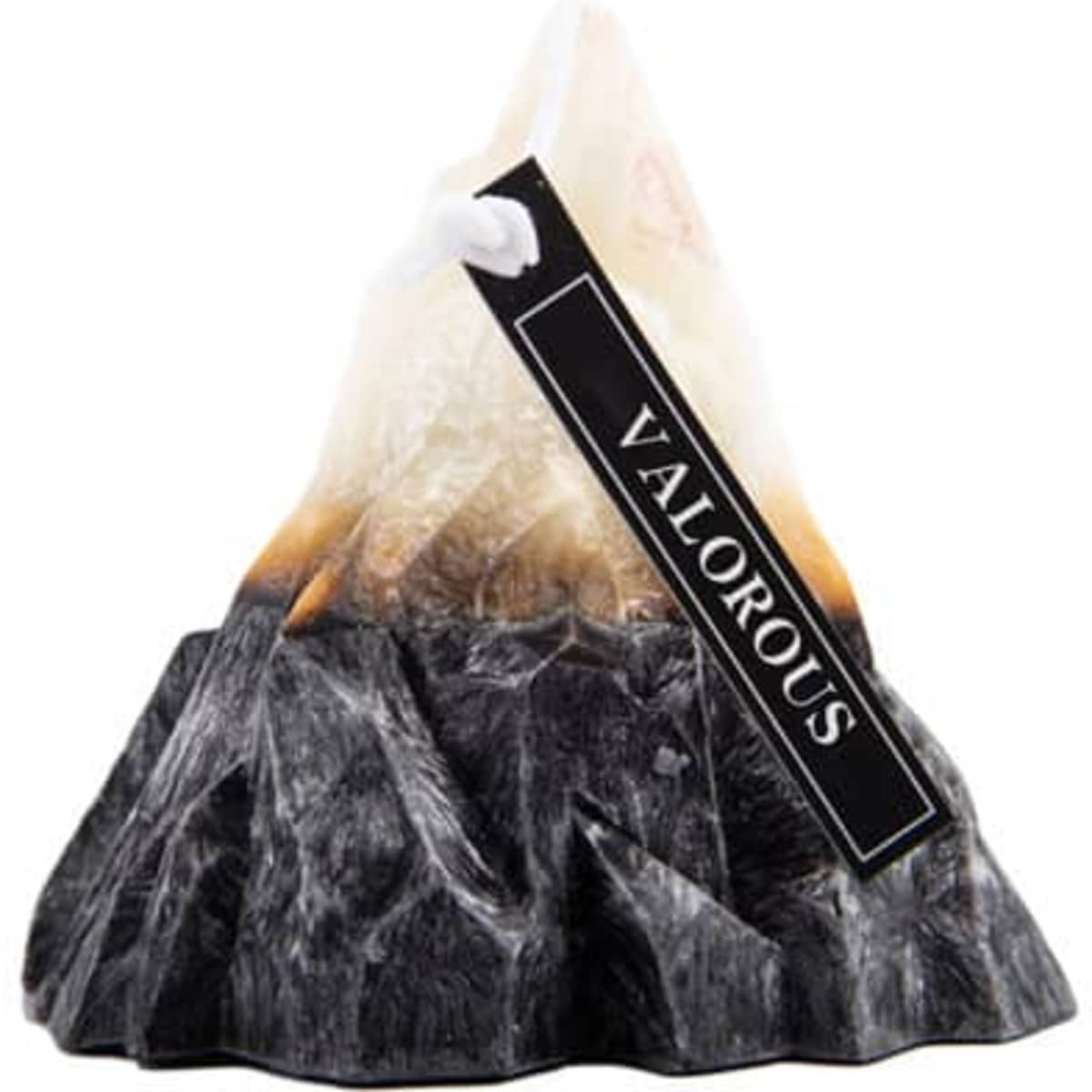 A volcano-shaped scented candle in shades of black, grey, and cream, featuring a tag.