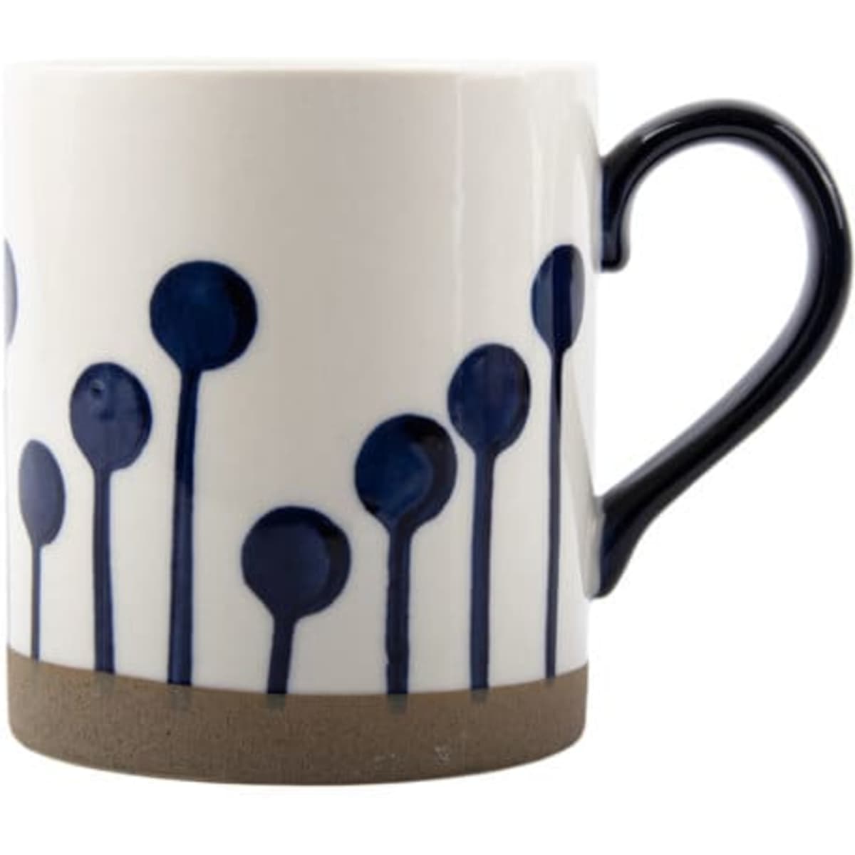A hand-painted ceramic coffee mug featuring a white body with navy blue circular designs and a brown base.