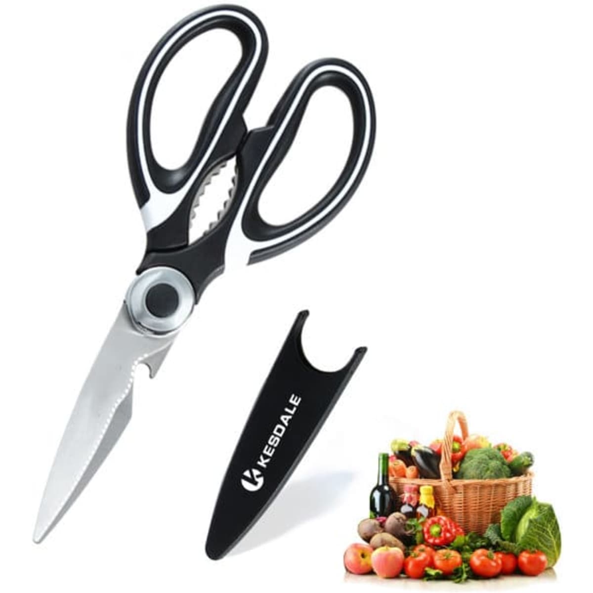 A pair of black multifunctional food scissors with a protective cover, alongside a basket of assorted vegetables and wine.