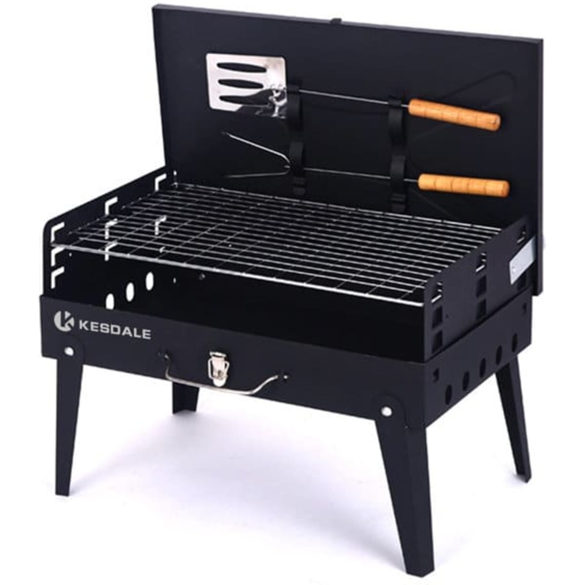 A black outdoor barbecue grill with a tool set, featuring a grill rack and wooden-handled utensils. It has a lid and legs.