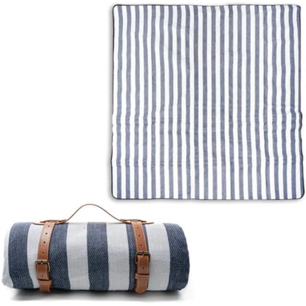 A striped picnic blanket in shades of navy and white, rolled up with a brown leather carry handle, featuring a logo.