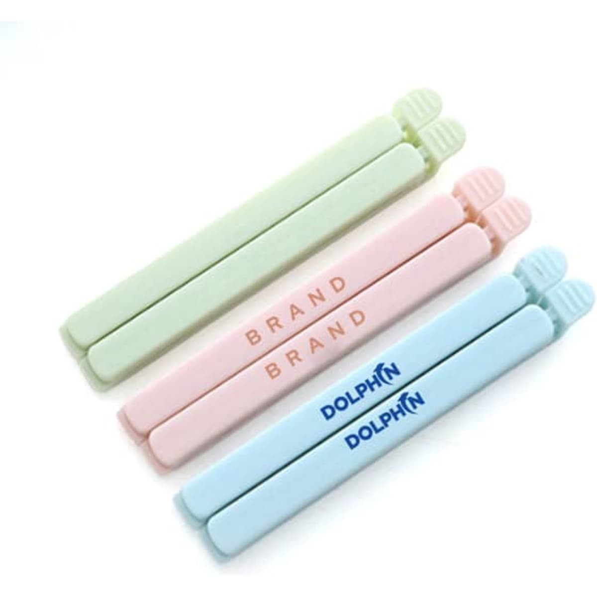 A set of three food bag sealing clips in pastel green, pink, and blue, each featuring a logo.