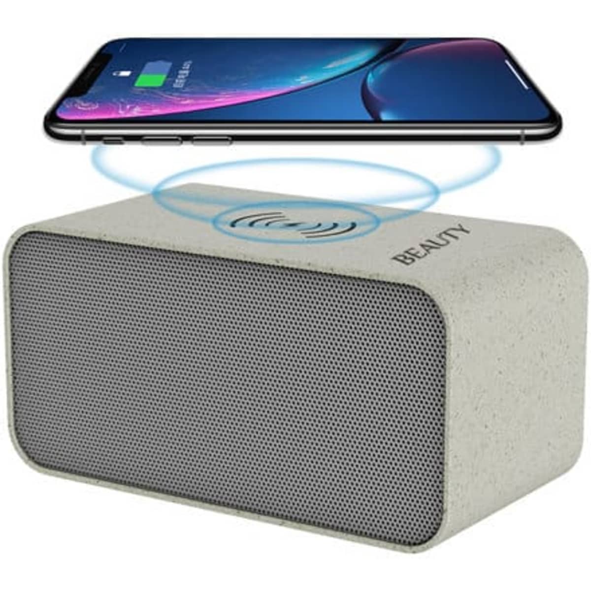 A portable wireless speaker in grey with a phone placed above for wireless charging. Features a logo on the side.