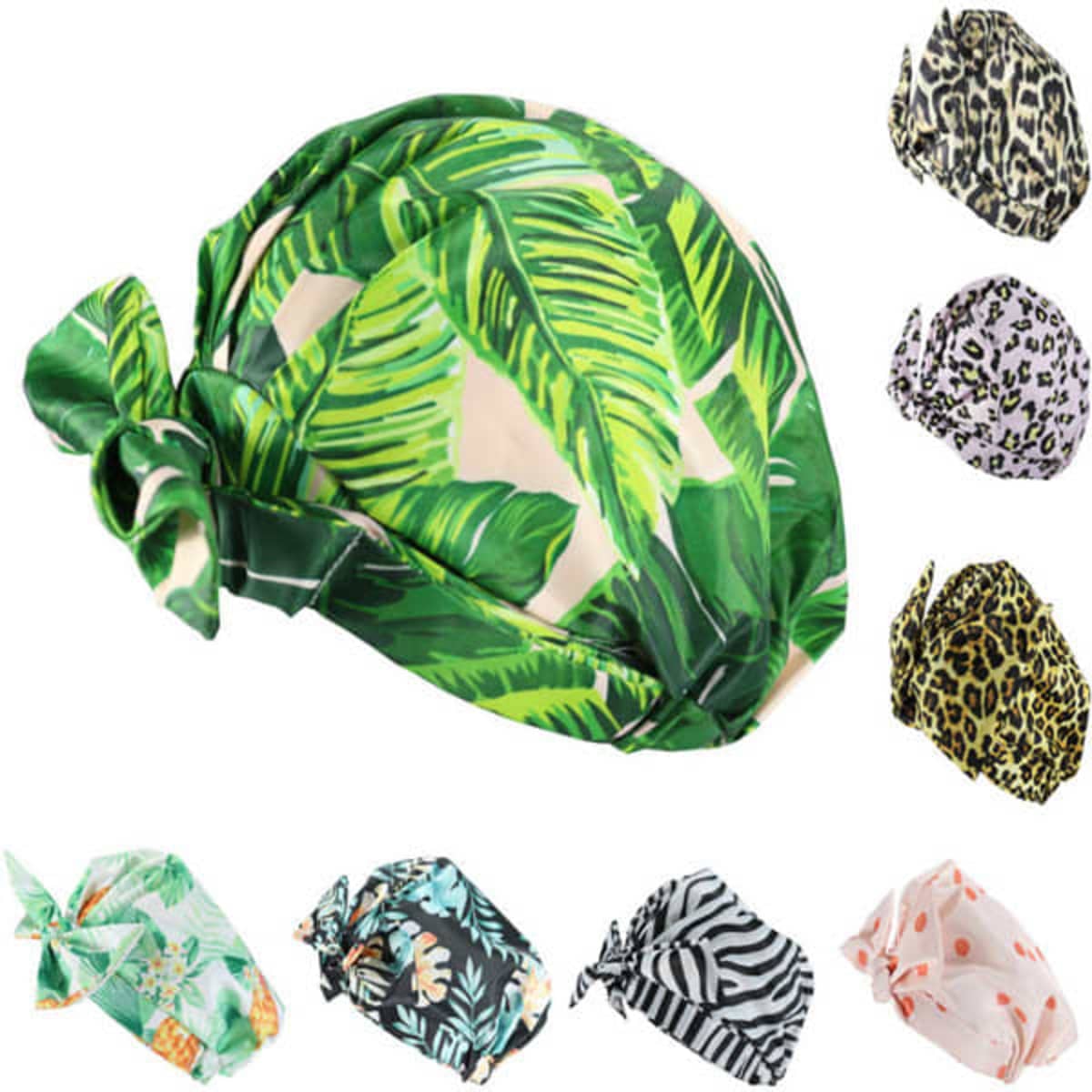 A collection of waterproof summer swimming caps featuring various tropical and animal print designs in vibrant colours.