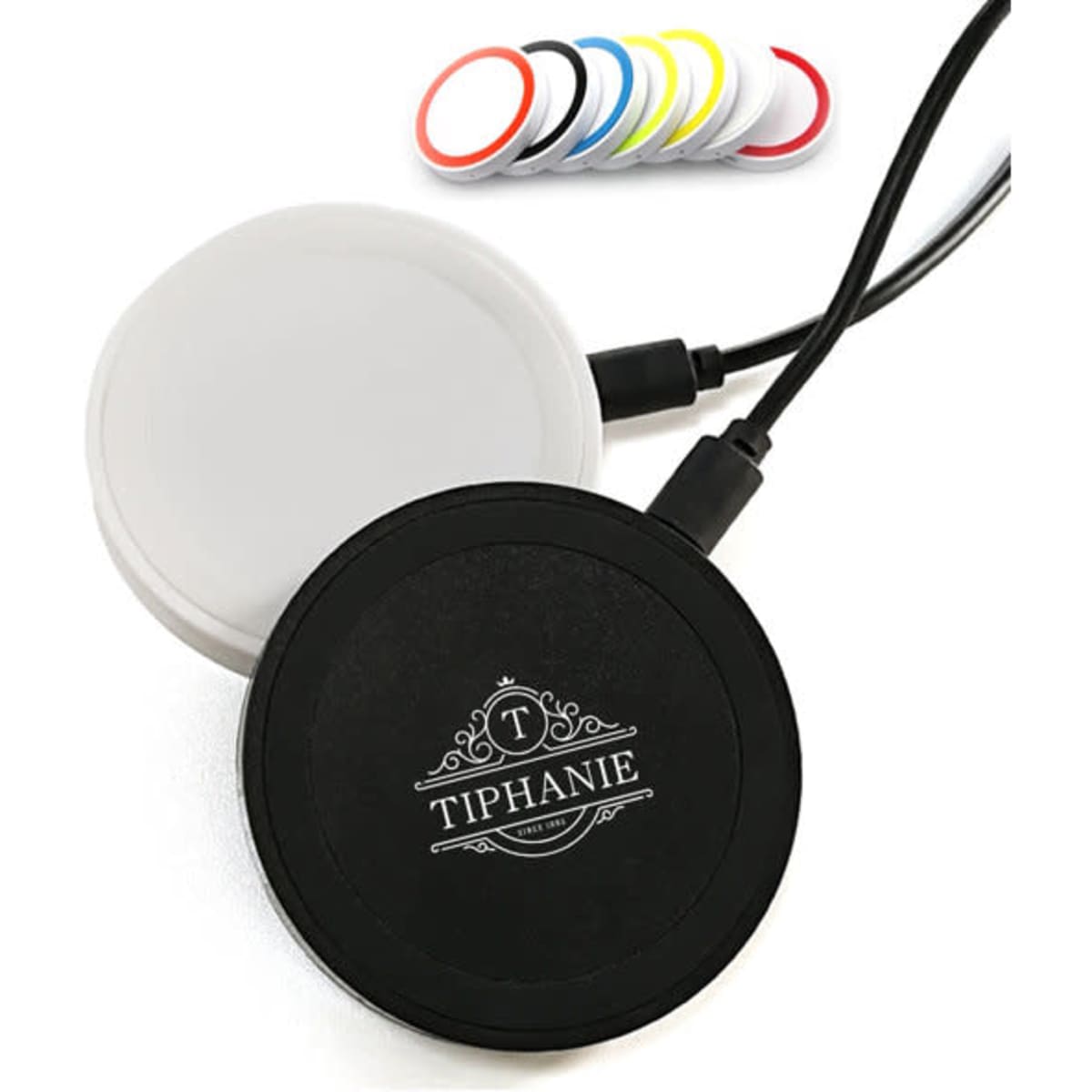 A wireless charger in black and white with a logo, accompanied by a selection of coloured charging pads.