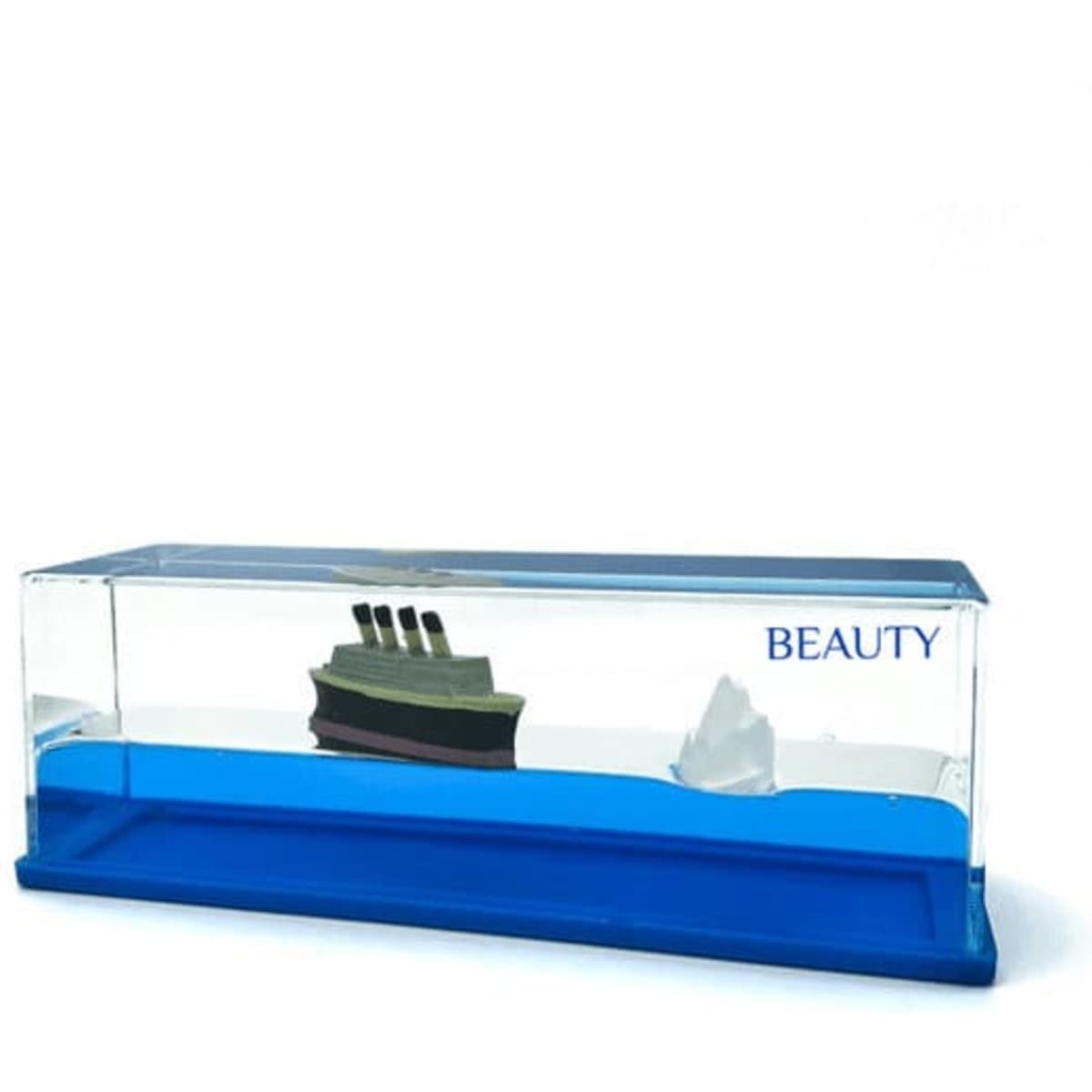A drink bottle featuring a cruise ship floating in blue liquid, encased in a clear acrylic design with a blue base.