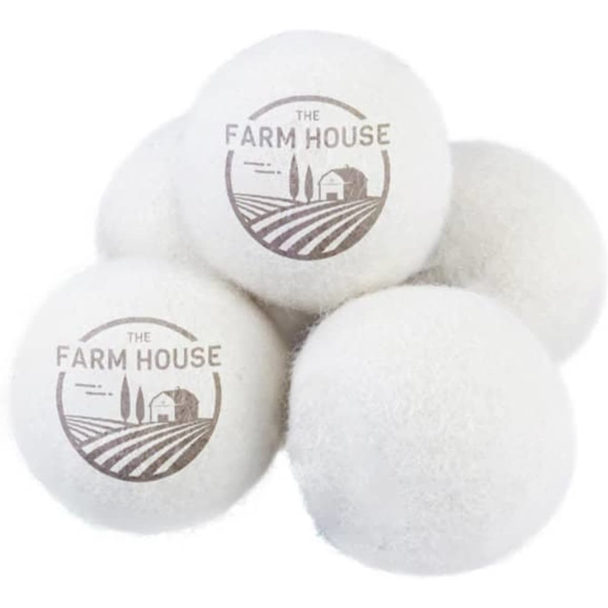 A set of five white wool dryer balls with a logo, featuring a farmhouse design.