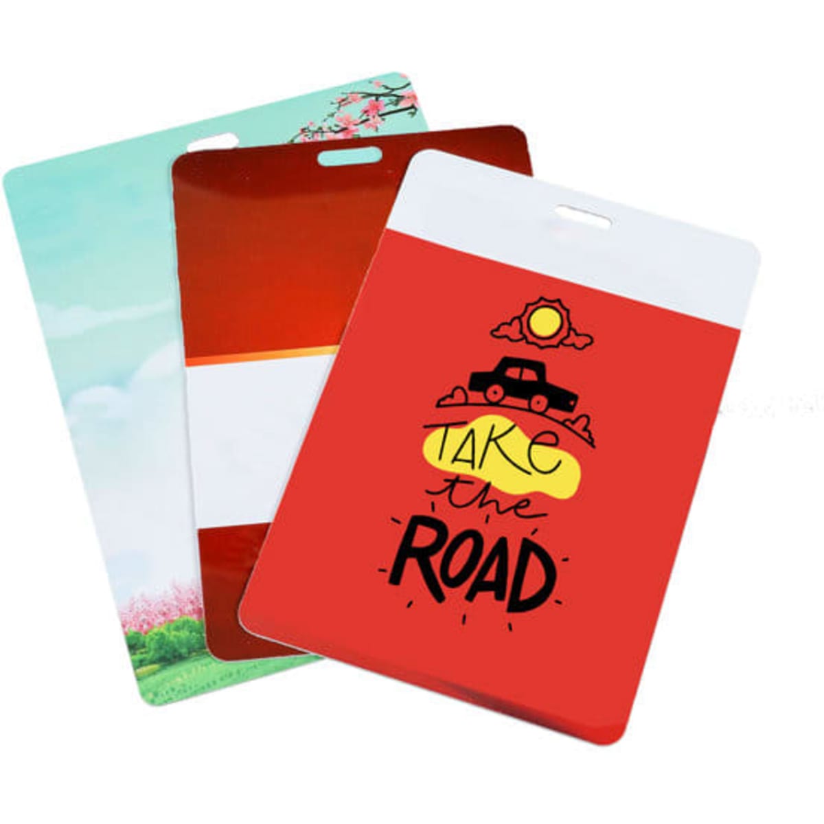 Three PVC exhibition cards in vibrant colours, featuring various designs and a logo on each card.