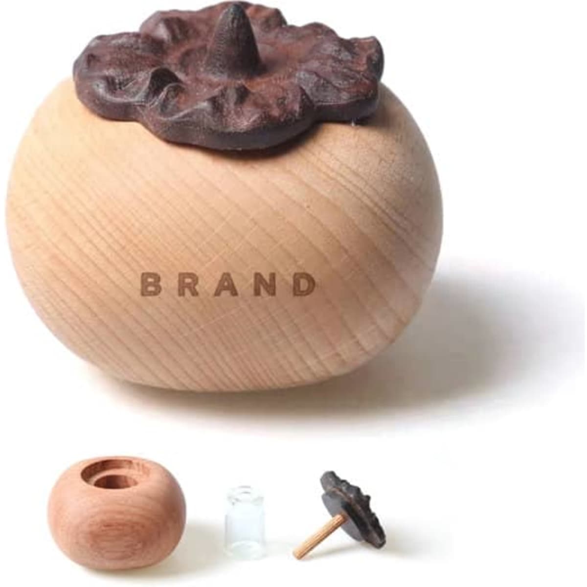 A persimmon-shaped aroma diffuser in wooden tones with a dark brown lid, featuring a small clear insert.