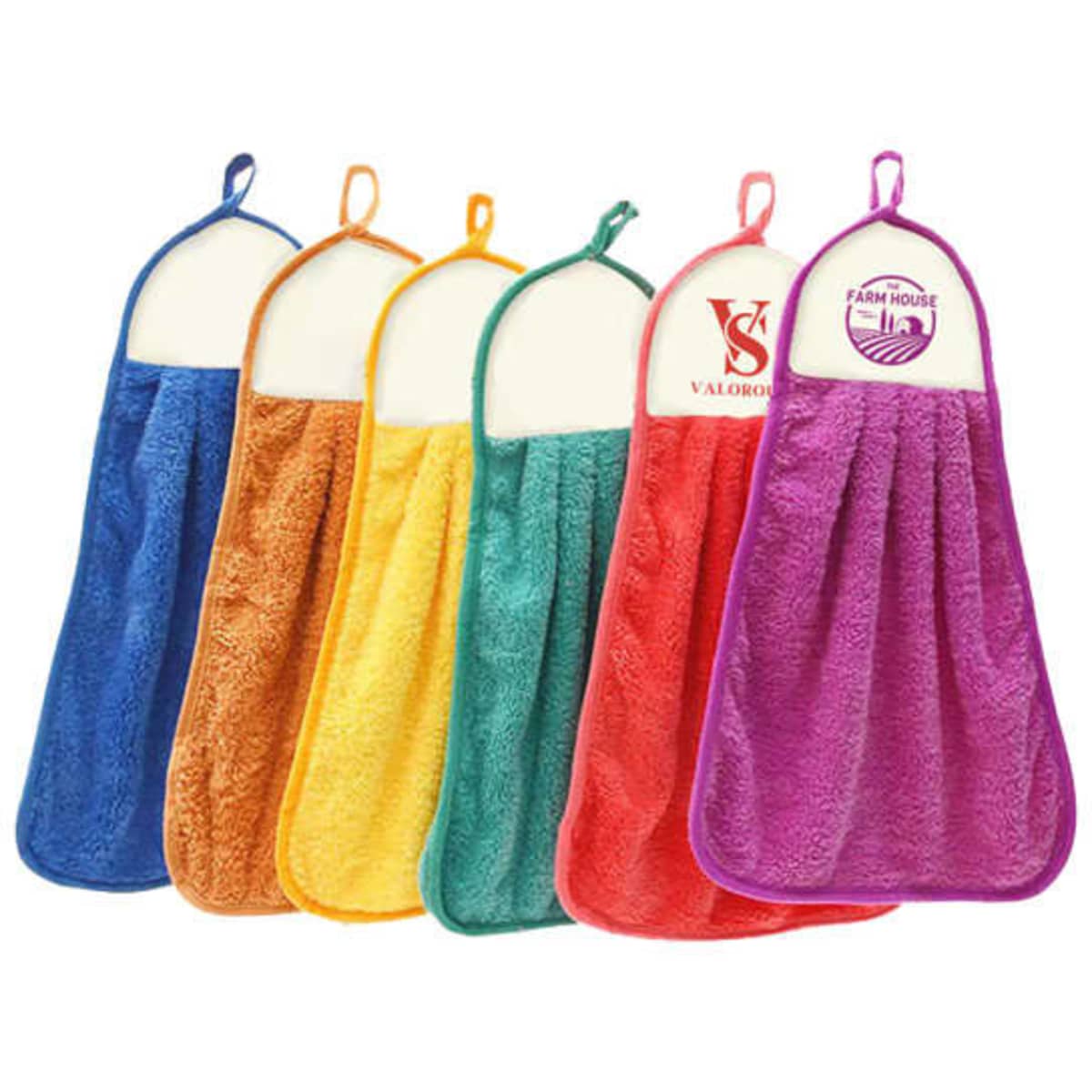 Five hanging coral velvet hand dry towels in various colours, featuring a loop for hanging and a logo on one.