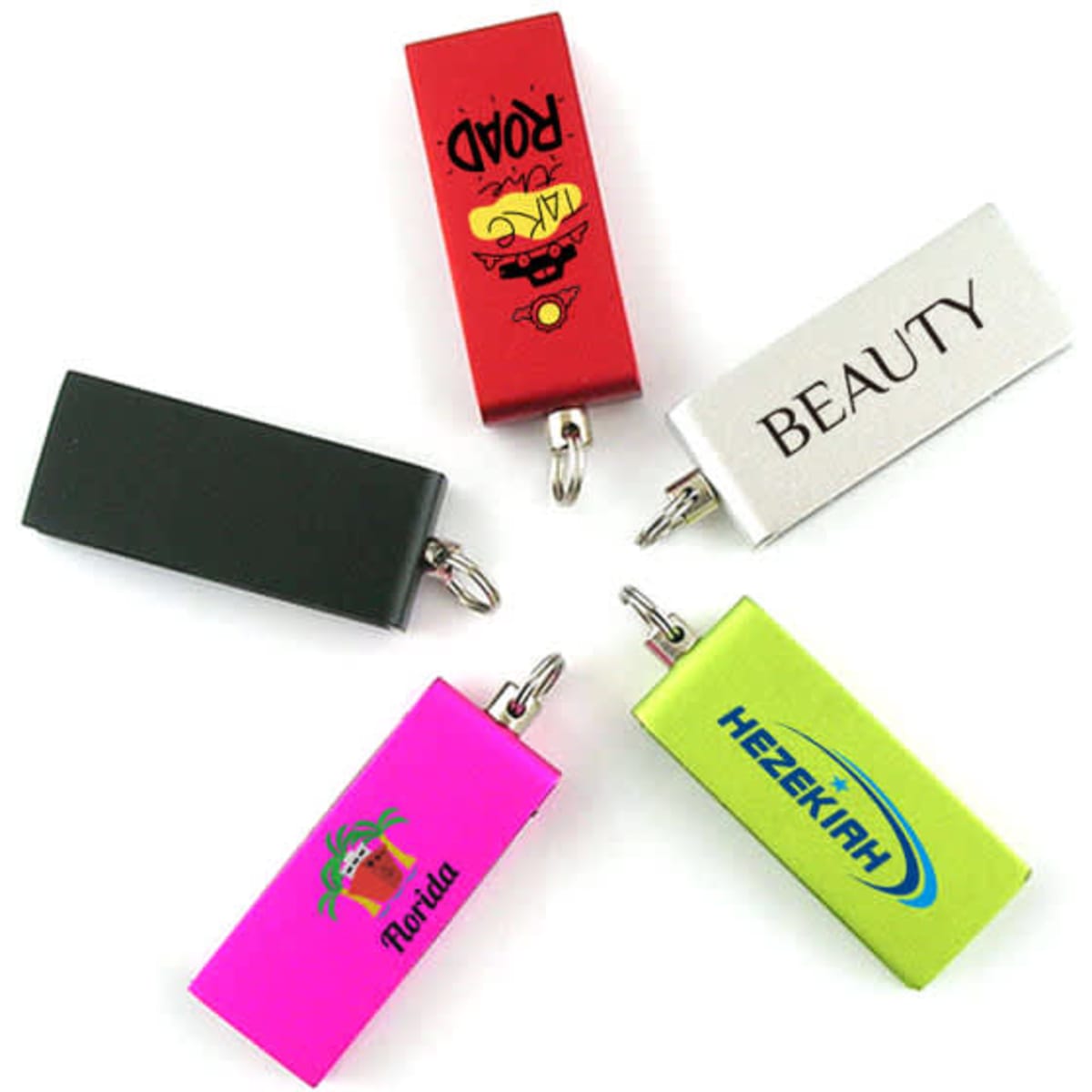 Five rotatable USB flash drives in varied colours: red, green, black, pink, and silver, each with distinct branding.