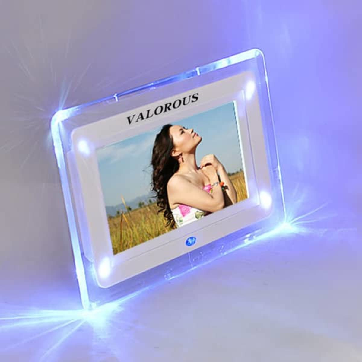 A 7-inch acrylic LED digital photo frame with blue lighting, displaying a portrait of a woman outdoors.