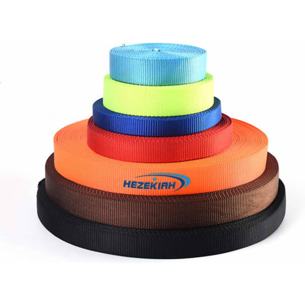 A stack of colourful polyester jacquard binding webbing in shades of blue, green, orange, red, brown, and black, featuring a logo.