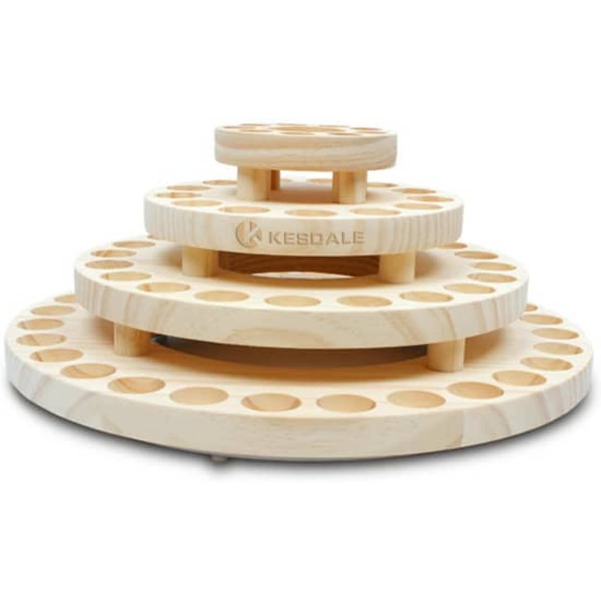 A wooden essential oil storage carousel in three tiers, featuring circular designs and multiple holes for bottles.