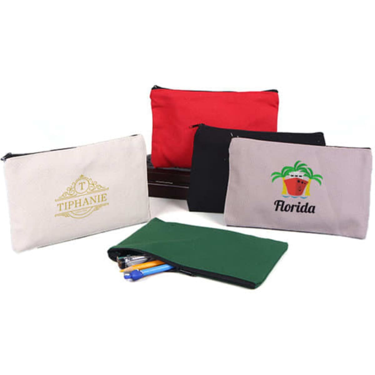 A set of canvas pouches in red, black, beige, and green, featuring zippers and logos on some.