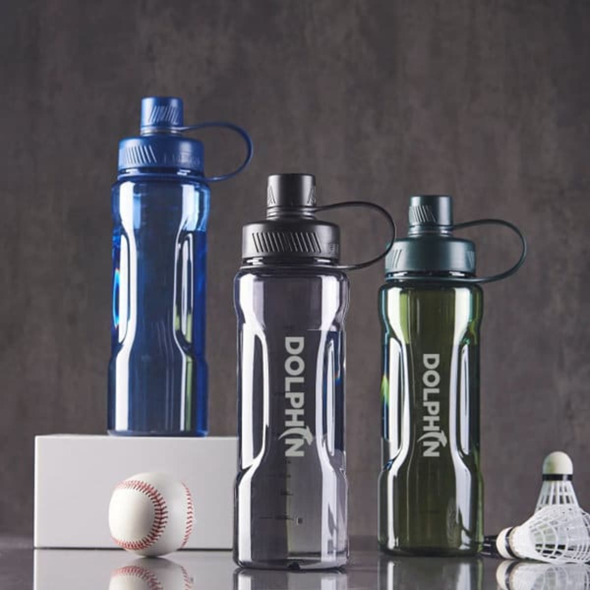 A drink bottle set featuring three large capacity space cups in blue, clear, and green, with a logo on each bottle.