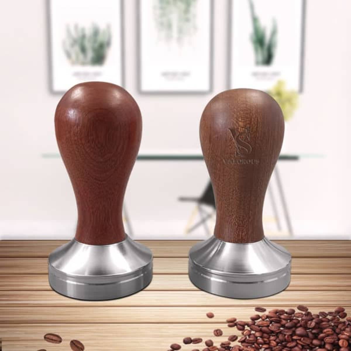 Espresso coffee tamper with a stainless steel flat base and a wooden handle in shades of brown, featuring a logo.