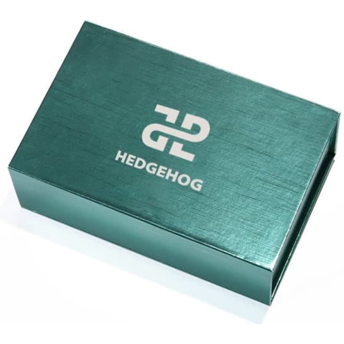A teal gift box with a magnetic lid and an embossed logo on the top.