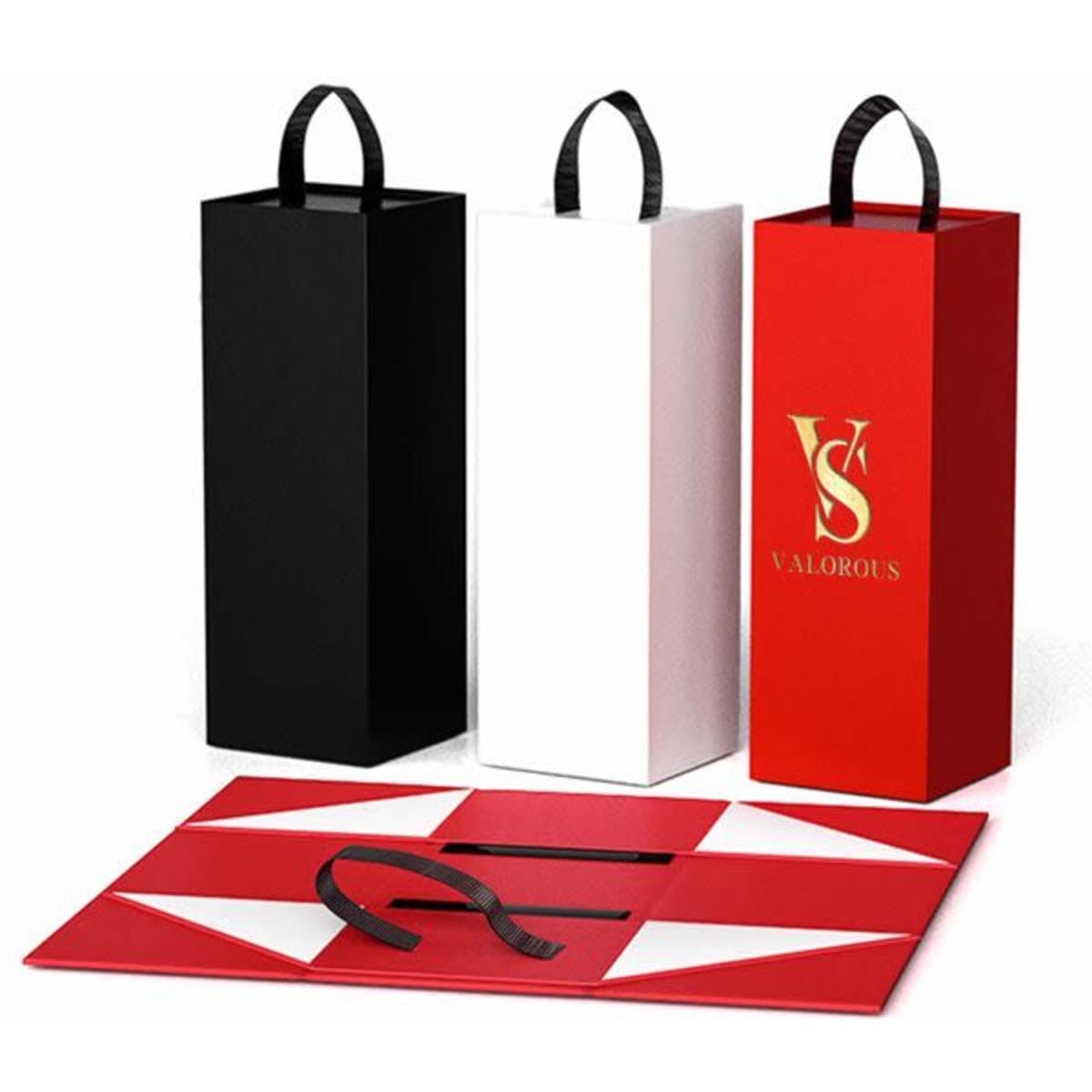 A set of three collapsible wine boxes in black, white, and red, with handles and a decorative mat.
