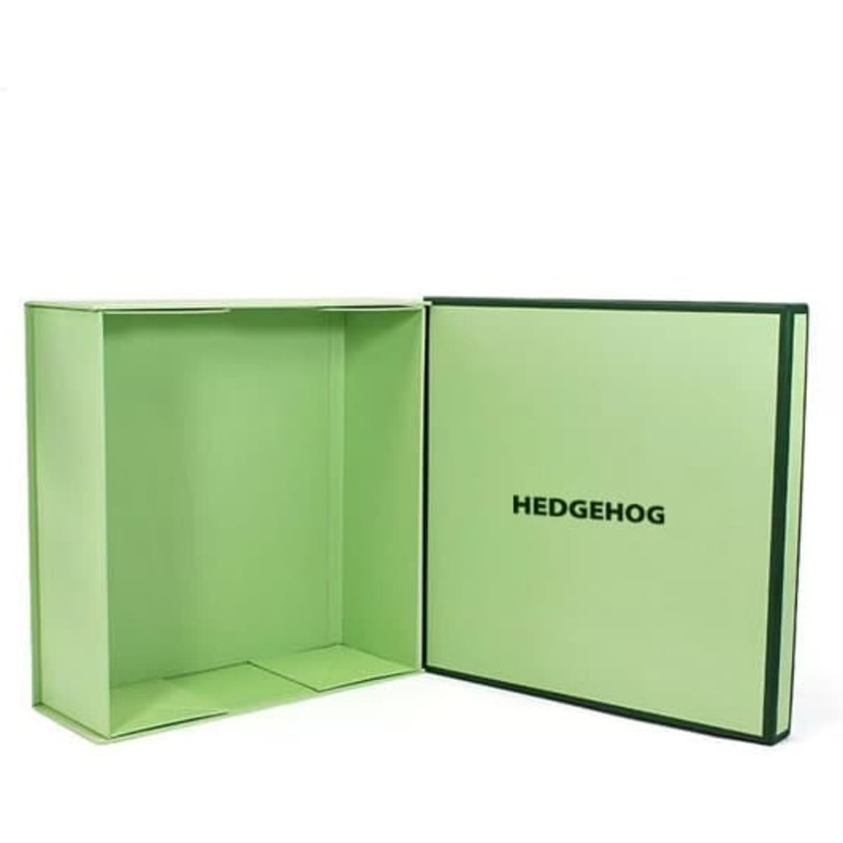 A square gift box with lid, featuring a light green exterior and a dark green trim. It has an interior space for storage.