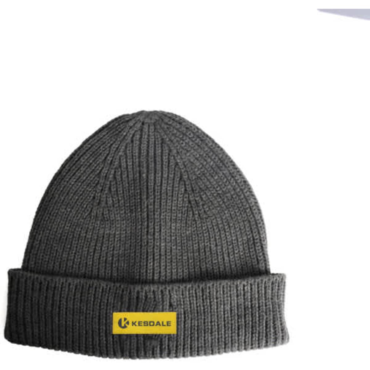 A grey knit beanie with a folded cuff and a logo patch on the front.