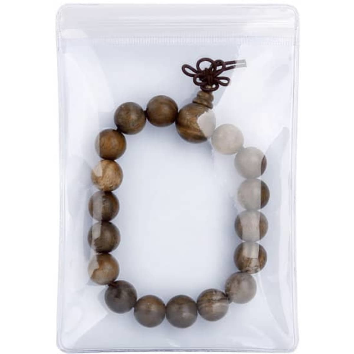 A clear plastic bag containing a beaded bracelet made of brown wooden beads, secured with a string closure.