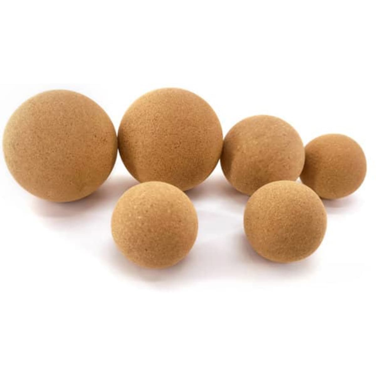 A set of tan cork balls in various sizes, featuring a smooth texture and a natural finish.