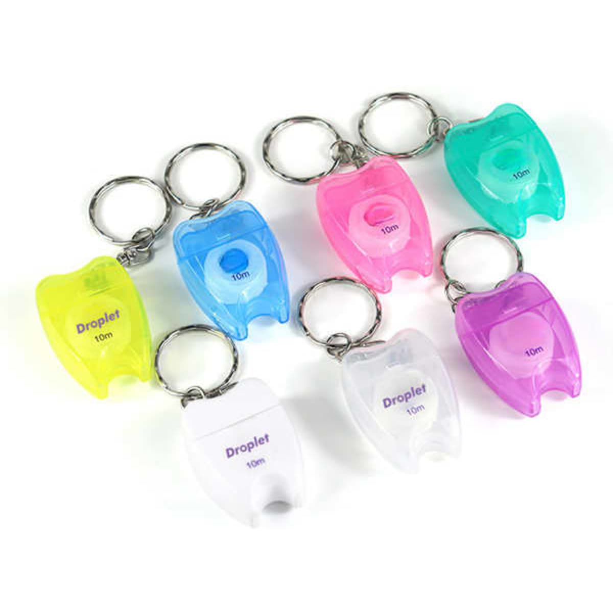 A collection of portable dental floss keyrings in yellow, pink, purple, and clear colours, each with a keychain attachment.