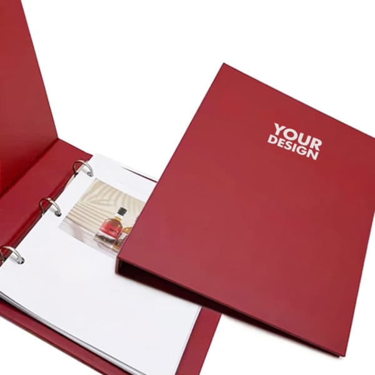 A red custom cardboard 3-ring binder with a blank interior and a logo on the cover.