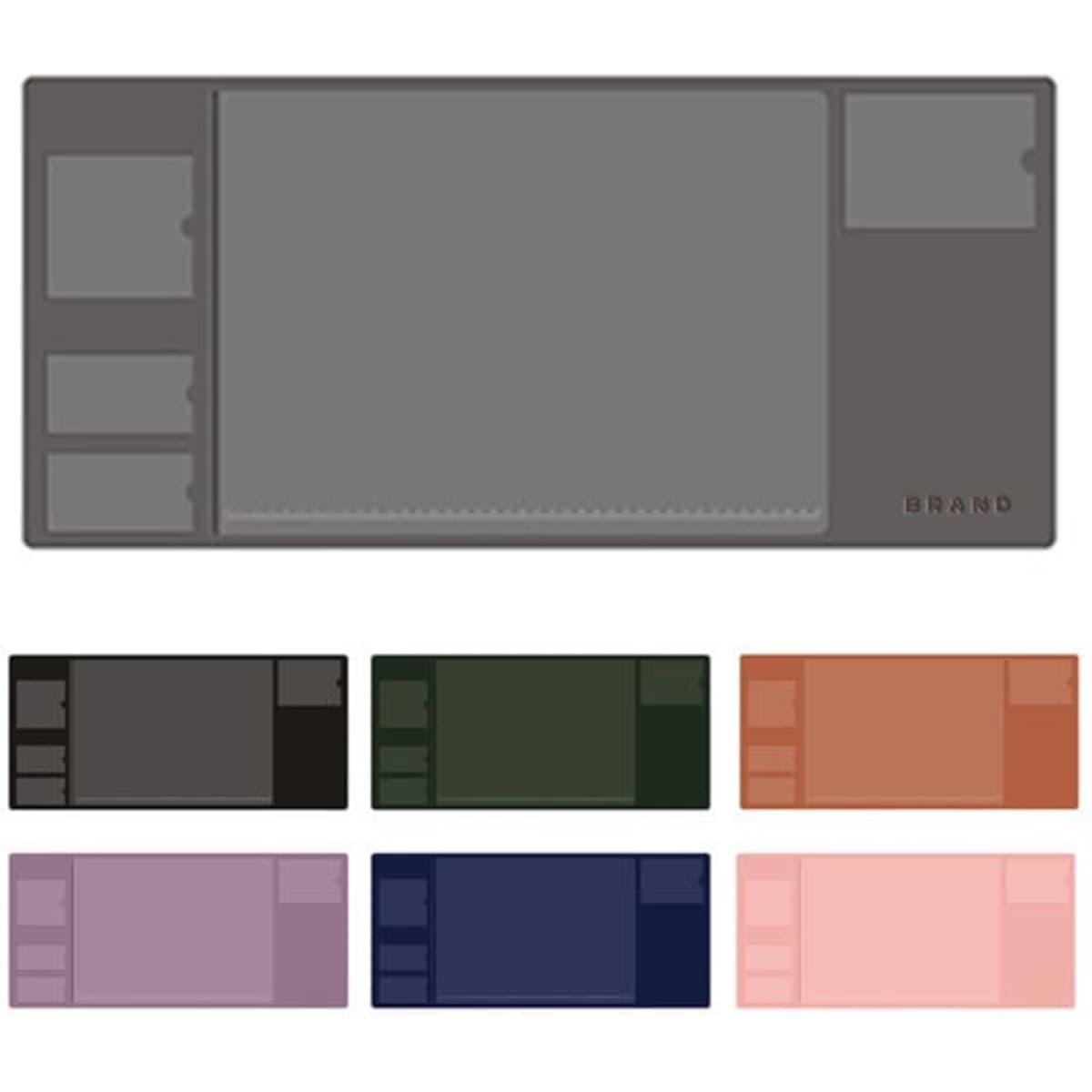 A multifunctional desk pad in various colours, featuring multiple pockets and a logo. Available in grey, black, green, copper, purple, and navy.