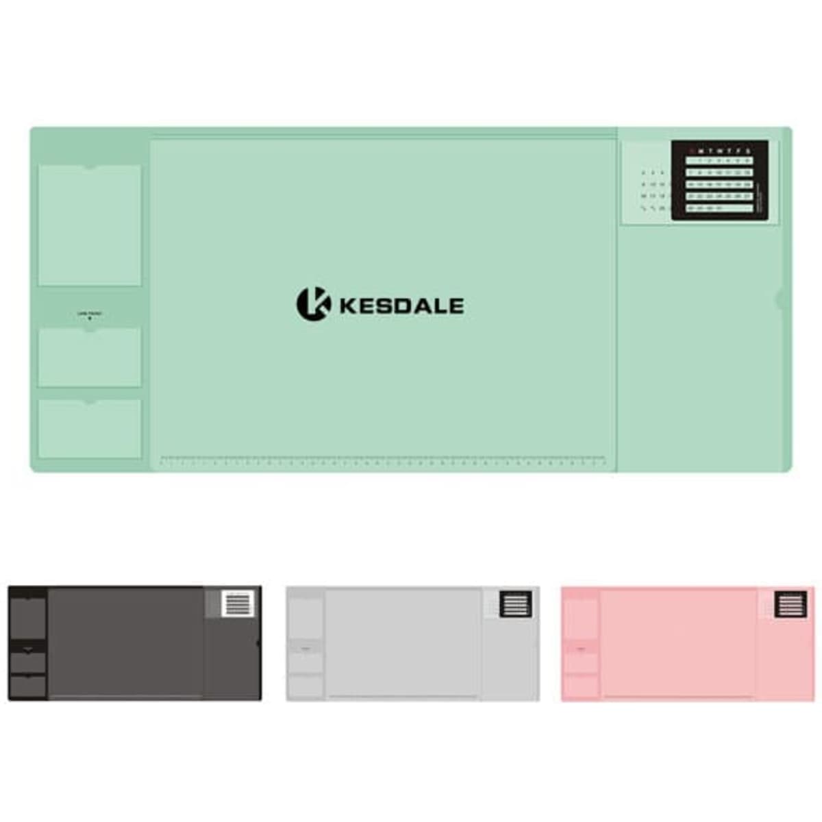 A multifunctional office desk pad in mint green with compartments, featuring a logo and available in black, grey, and pink.