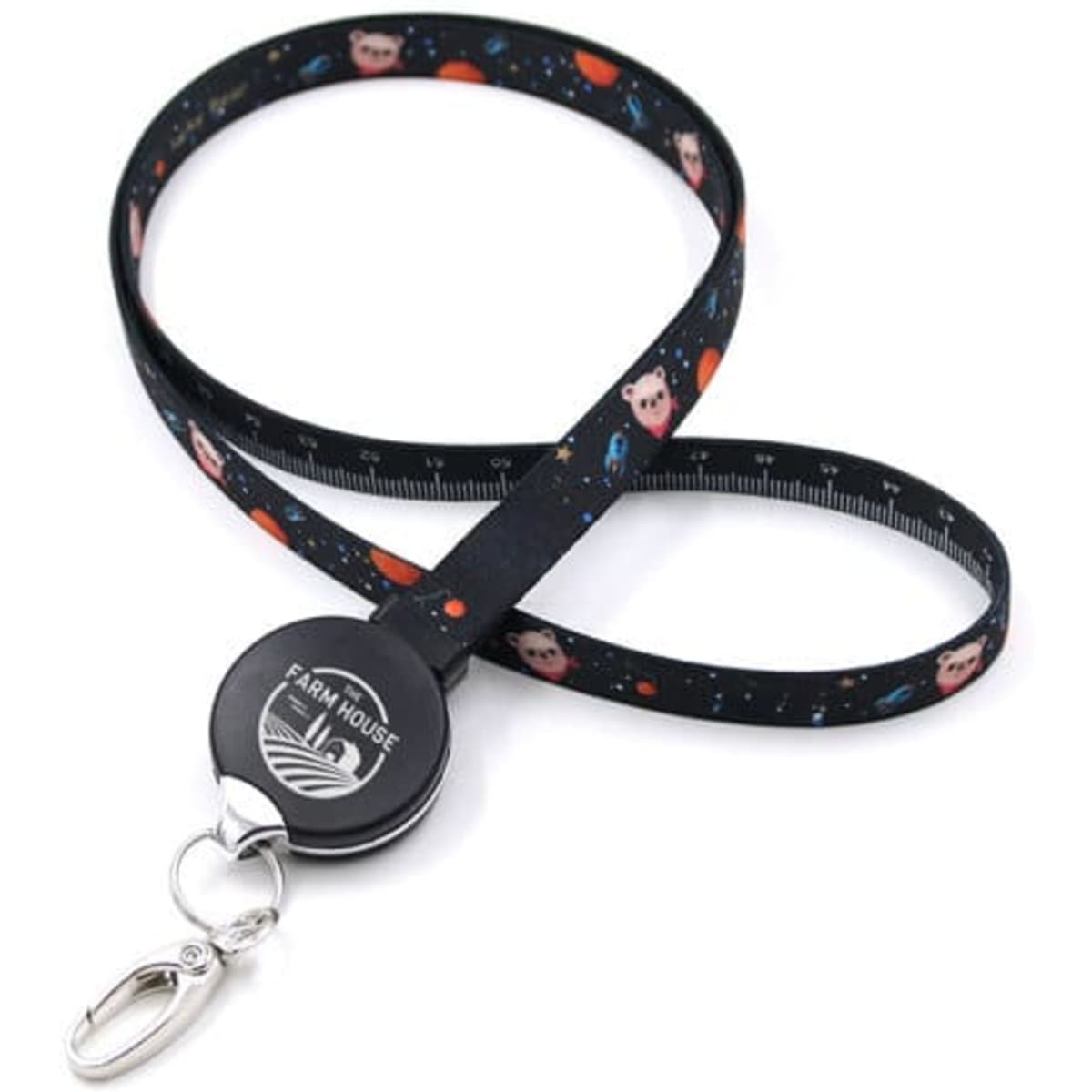 A black lanyard features colourful owl designs, attached to a retractable reel with a metal clip.