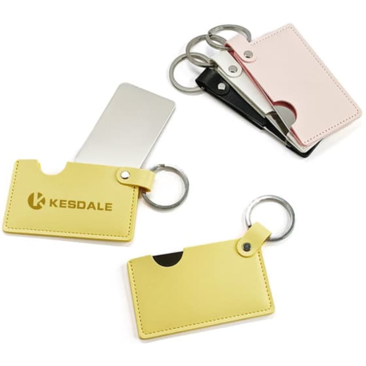 A rotating credit card mirror with a PU leather holder, available in yellow, pink, and black, featuring a logo.