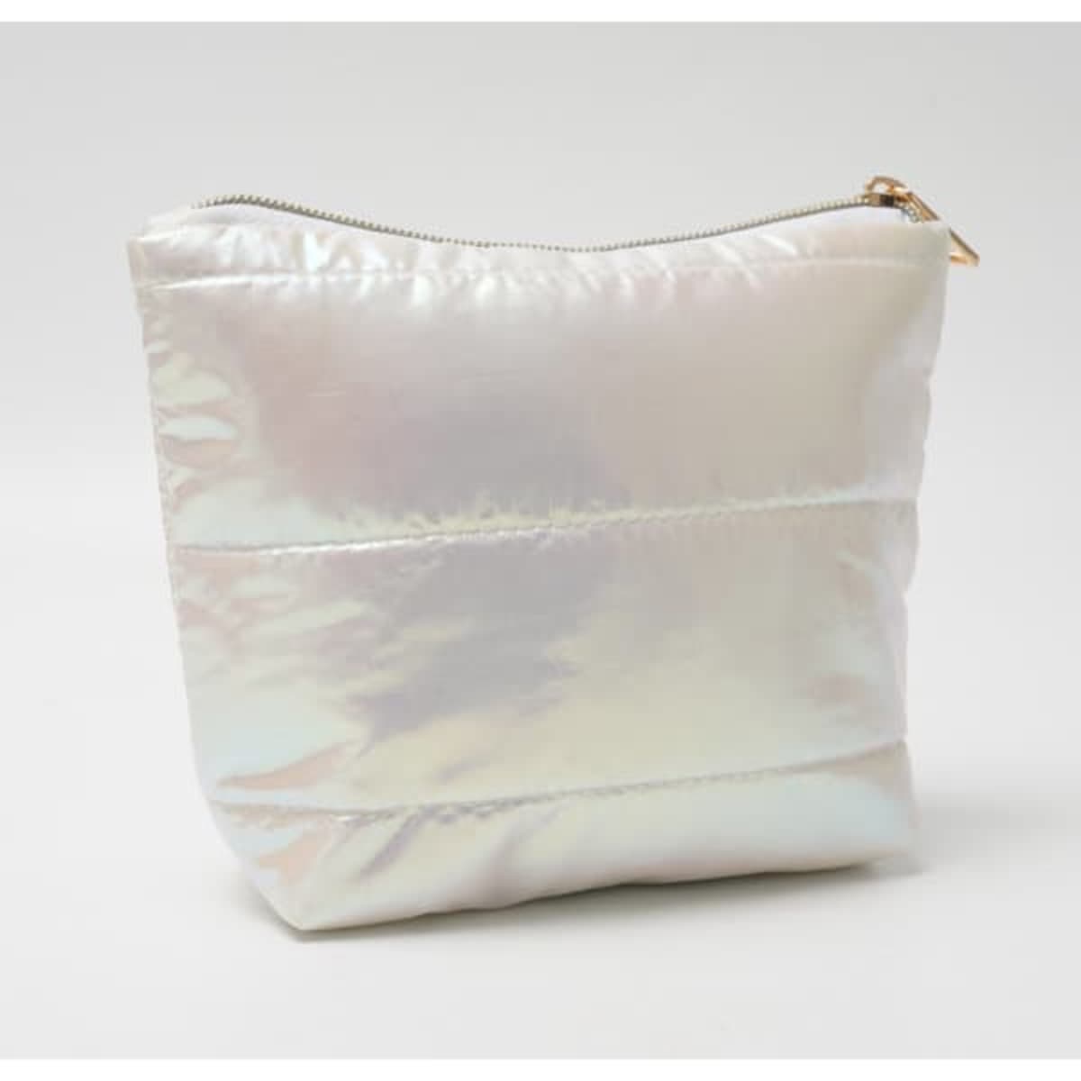 A quilted cotton makeup bag in an iridescent finish, featuring a zip closure and subtle quilted design.