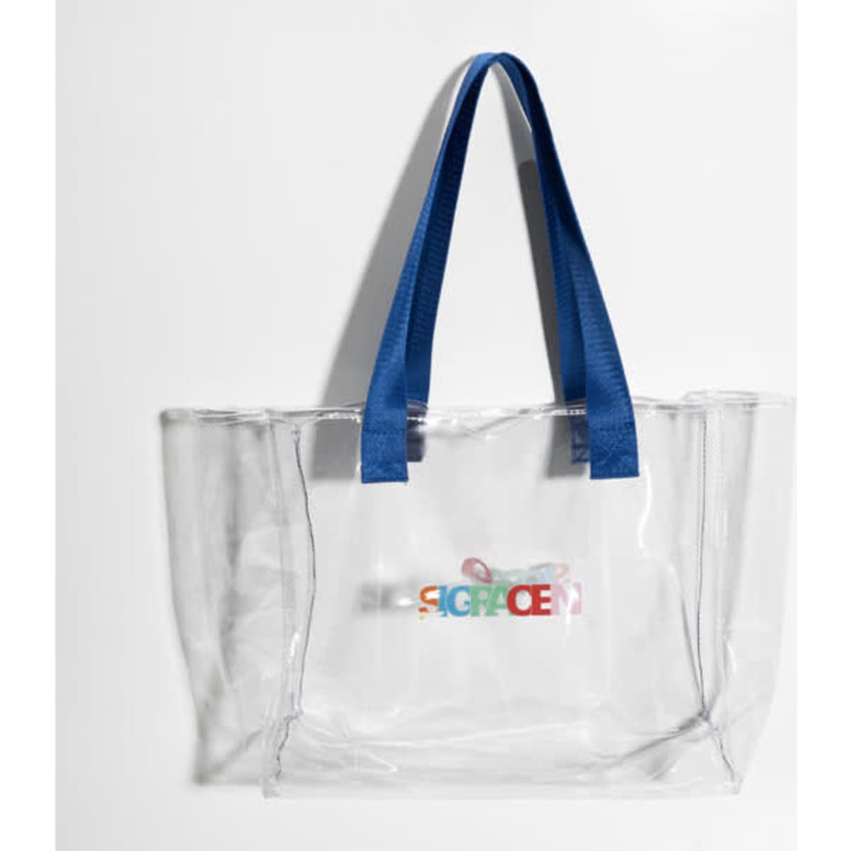A large transparent tote bag with blue handles and a branded logo in various colours.