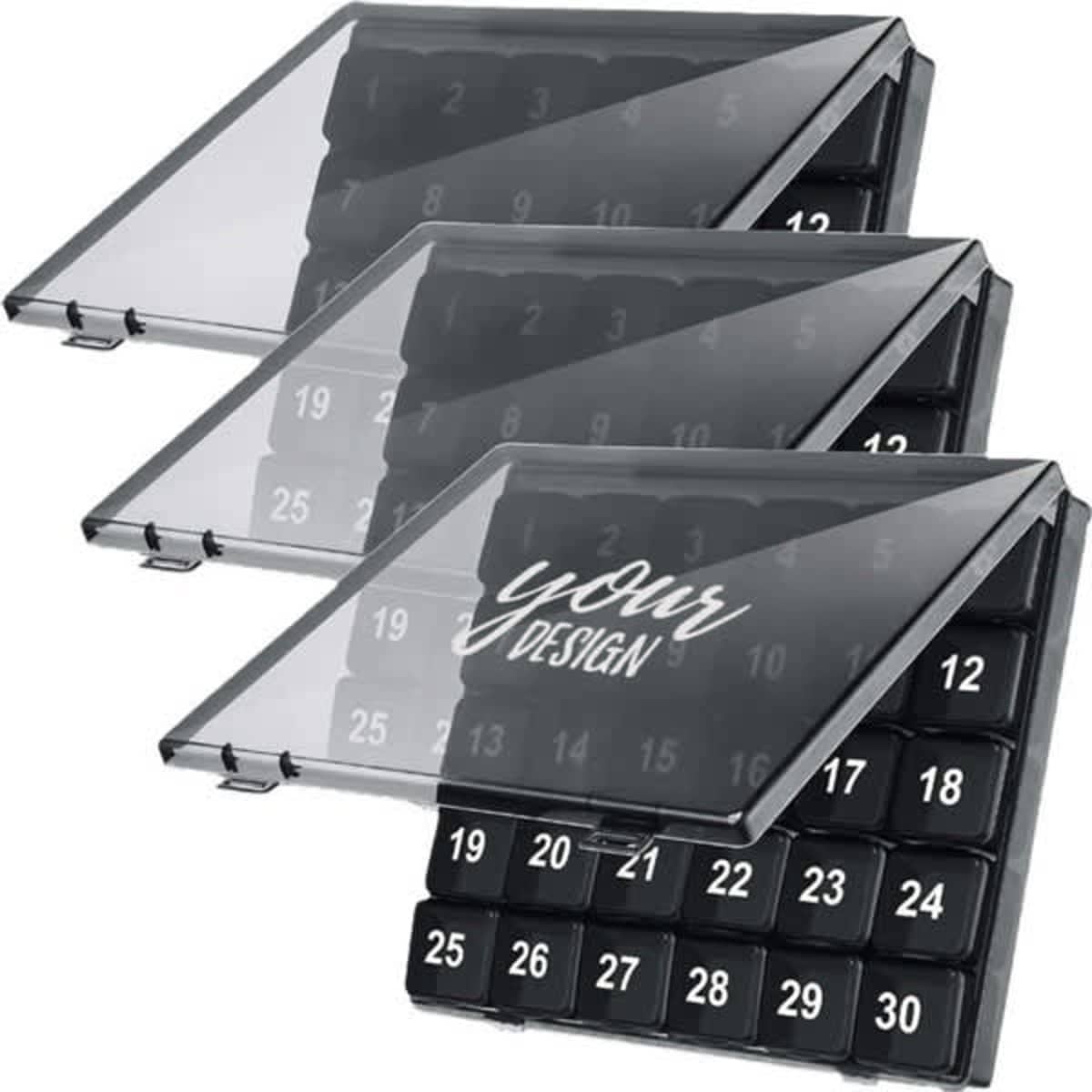 A monthly pill organizer with three transparent compartments, featuring black numbered slots beneath a clear lid.